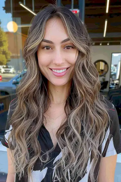 Face-framing hairstyle with a money piece and balayage for women over 30