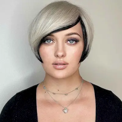 Sleek Cut with Side-Swept Bangs