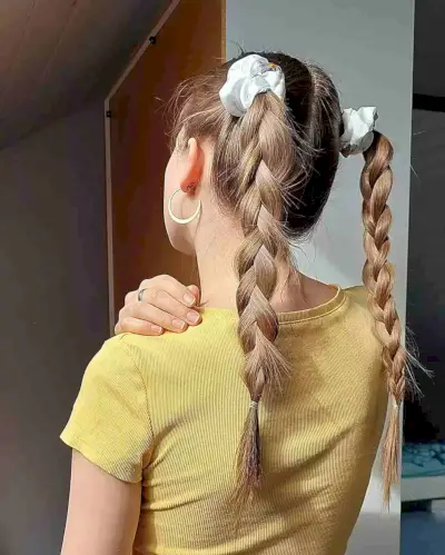 Cheerleading-Perfect Braided Pigtails with Scrunchies