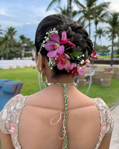 Hawaiian Big Bun Updo with Floral Accessories