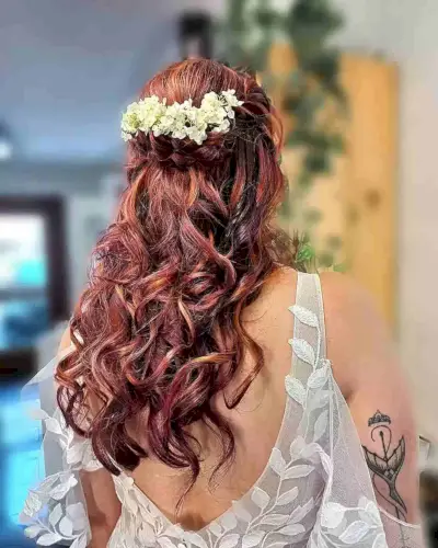 Hawaiian Plaited Half Upstyle with Mini Flowers for Long-Length Hair