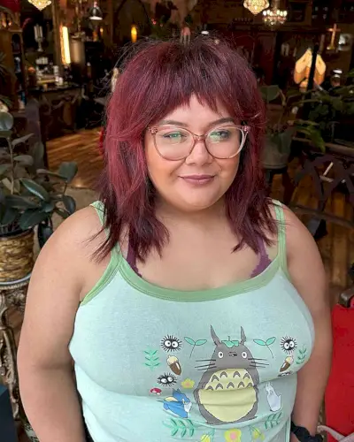 Peaked Framing Bangs for Ladies with Double Chins and a maroon hair color