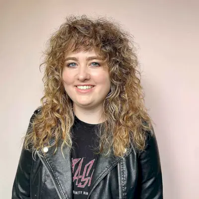 Messy Textured Shag with Bangs for Curly Hair
