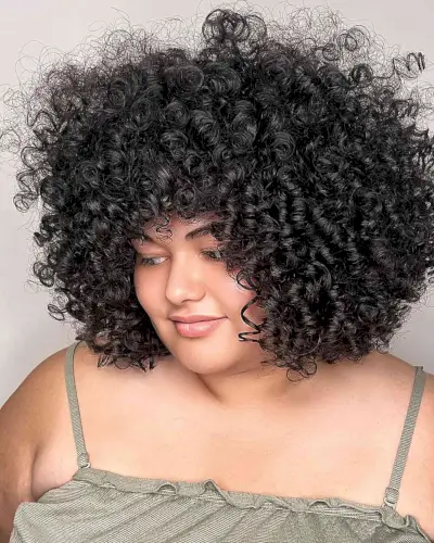 Rezo Cut Thick and Voluminous Curls for Fuller Faces