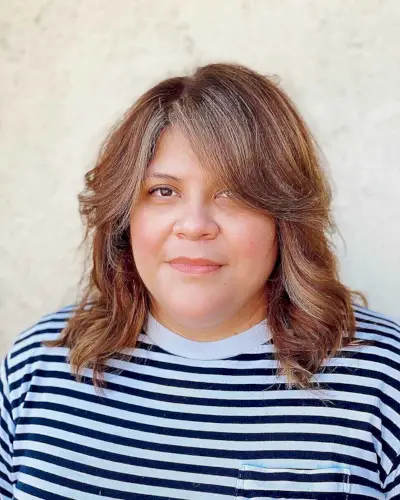 Low-Maintenance Medium Haircut with Side Part Curtain Bangs