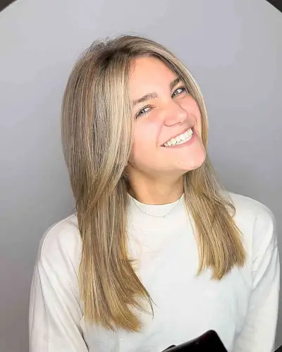 Mid-Length Sleek Cowboy Hairstyle with Front Layers