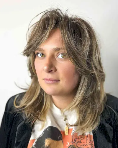 Undone Hairstyle on Medium Layered Cowgirl Cut