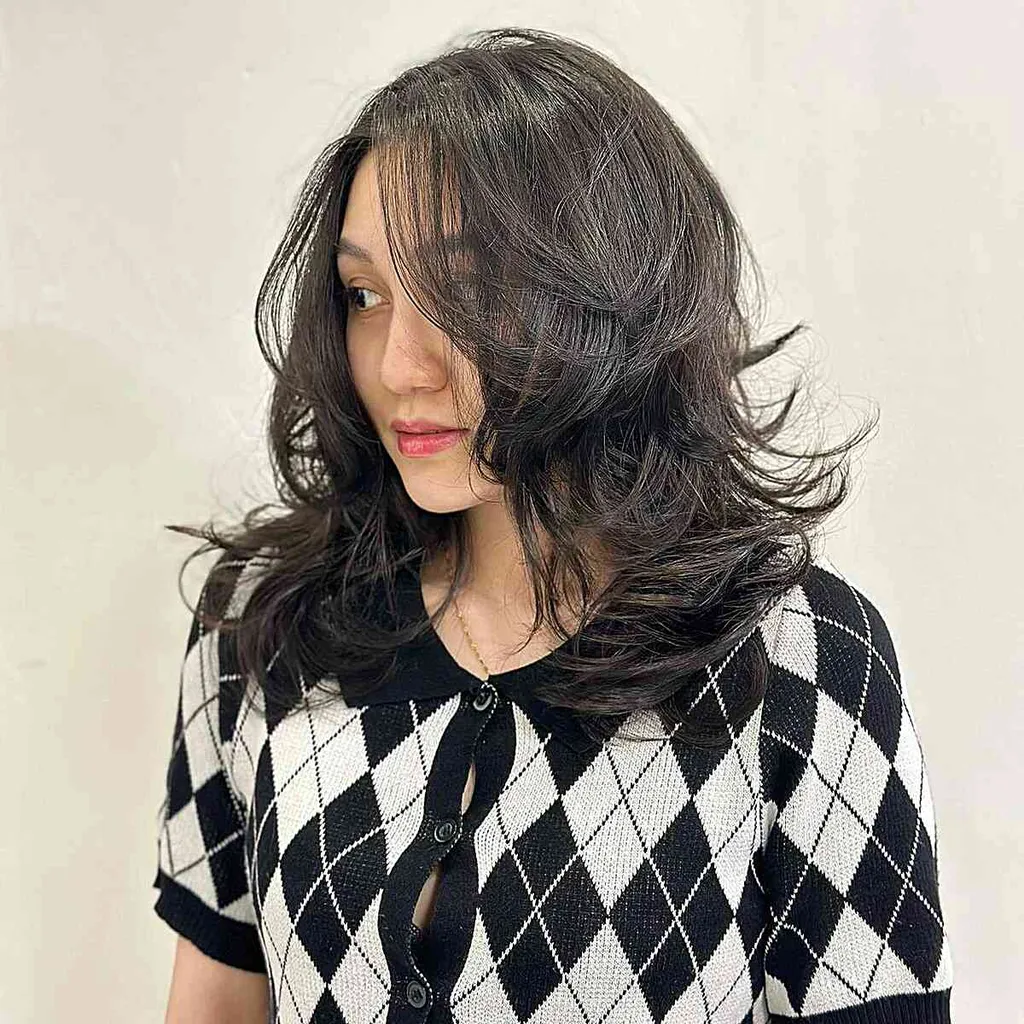 Teruggeveegd lang, nat kapsel' title=