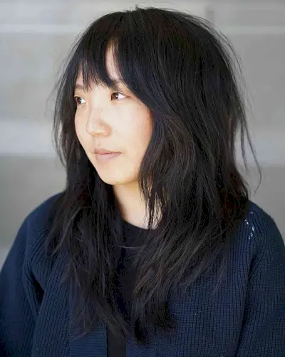 Razored Layers and Choppy Fringe for Mid-Length fine hair