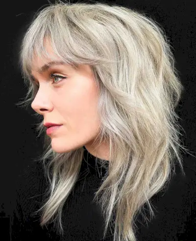 lob with bangs cut with a razor