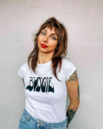 Punk-Inspired Razor Cut with choppy layers and bangs