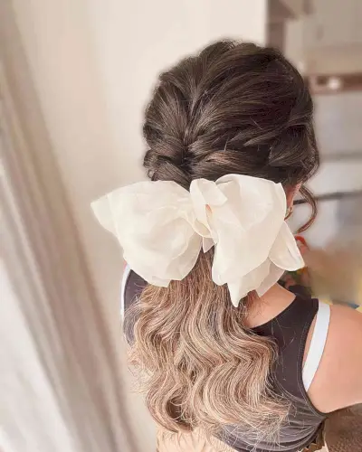 Low Textured Pony with Ivory Bow for Festival Events