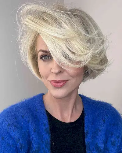 Disco Party Voluminous Side-Swept Shorter Bob with Long Bangs