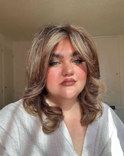 Medium Feathered Style with Face-Framing Fringe for Disco Parties