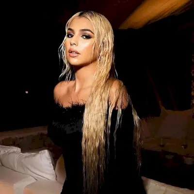 Sleek Wet Disco Look with Thin Waves for Longer Locks