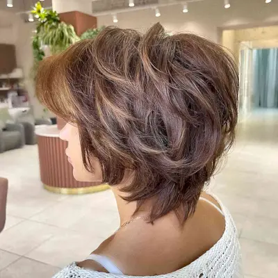 Bixie Cut with a Brown Balayage and Copper Tones