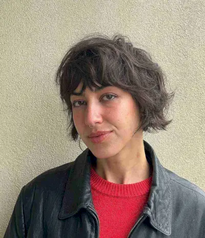 Messy layered bob haircut with inclusive choppy bangs