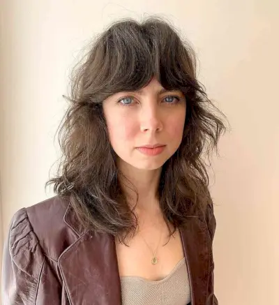 Summer Razored Shaggy Cut with Heavy Curtain Bangs