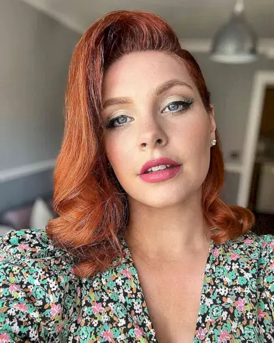 Vintage Deep Side Part on Shoulder-Length Copper Hair