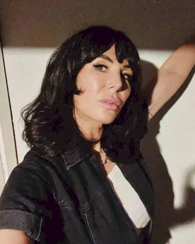 1960s Dark Brunette Glossy Hairstyle