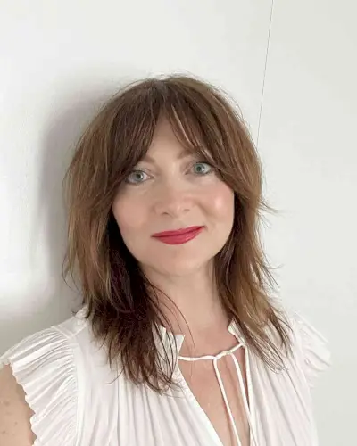 Medium Soft Messy Layered Rachel Cut with Curtain Bangs