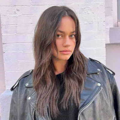 Long layered waves with natural texture on medium to thick hair