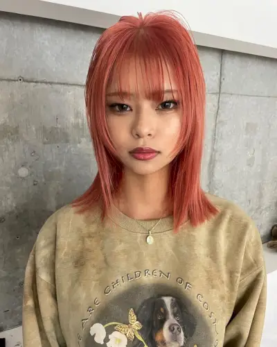 Shoulder-Length Wolf Cut with Wispy Bangs