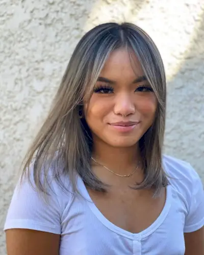 Straight fine hair with curtain bangs hairstyle