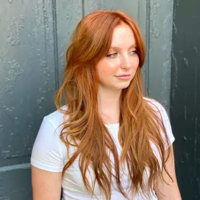 Curtain bangs for a round face shape