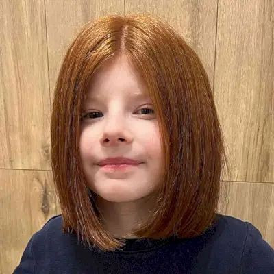 The Cutest Bob Cut with a Middle Part for Little Ladies