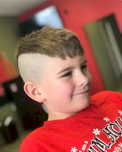 edgy mini mohawk fade cut for a little boy