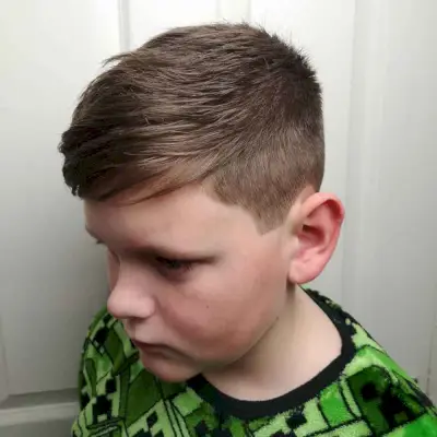 messy side-swept fringe for young boy with thin hair