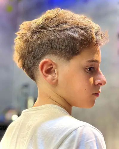 Messy Mid Drop Fade for Teen Guys with a sense of style