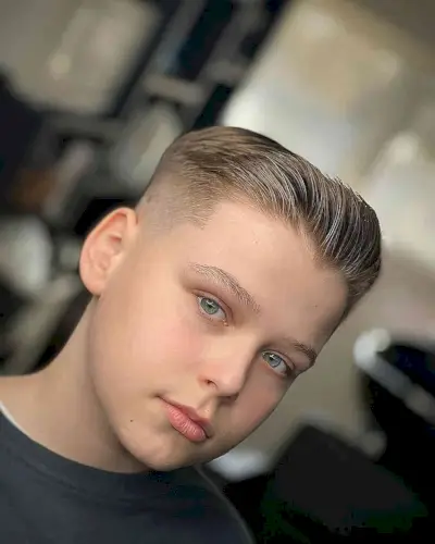 Short Top with Brushed Up Bangs for Teens with a skin fade on the sides