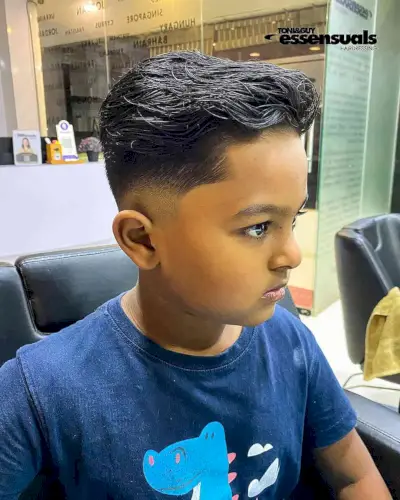 Mid Fade with a Longer Wavy Top for Boys