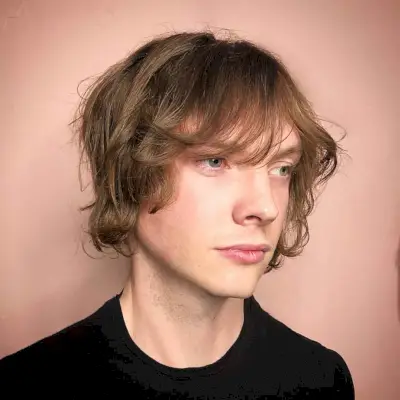 Surfer Shag haircut on a teen boy