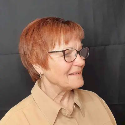 Short Razor Cut Pixie with Micro Bangs and Layers for Older Women