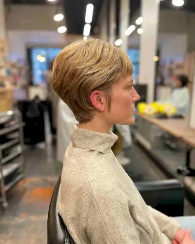 Short Sleek Wavy Pixie with Short Bangs and Layers