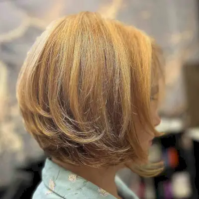 Short Golden Blonde Bob with Layered Swoopy Ends