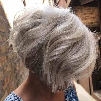 Short Platinum Blonde Layered Bob with Waves