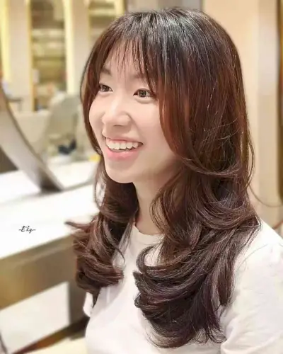 Wispy Bangs and Wavy Layers