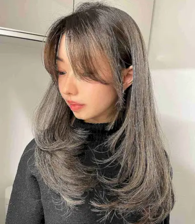 Brunette Swoopy Bangs and Layers