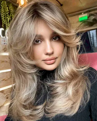 Thick Full Hair with Layers and Curtain Bangs