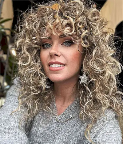 Curly Layered Haircut with Long Bangs