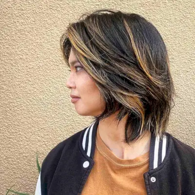 Mid-Length Shaggy Short Layered Bob with Warm Highlights