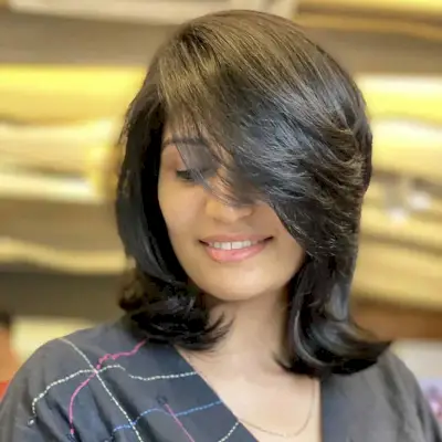 Sassy Deep Side Part and Layered Bangs on Short to Medium Dark Hair