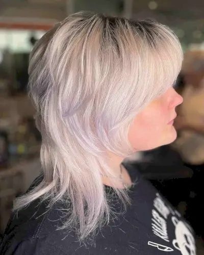 Vibrant Short to Medium Platinum Blonde on a Baby Mullet Shag