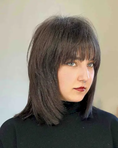 Sleek Medium Wolf Haircut with Short Layers