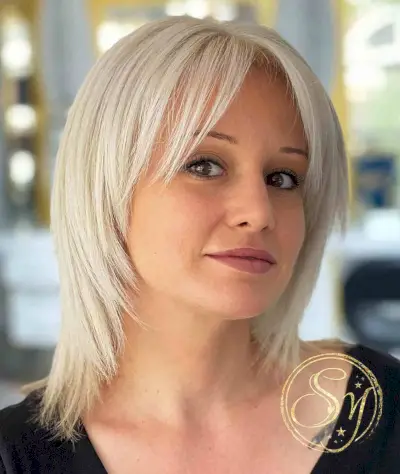Beautiful Platinum Choppy Short-to-Medium Haircut