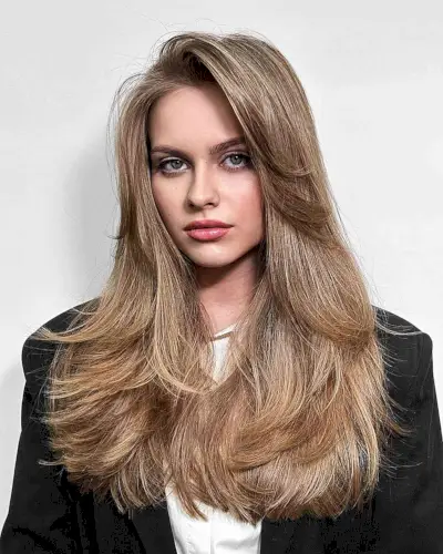 Straight Layered Blowout for medium to long length hair with a side part